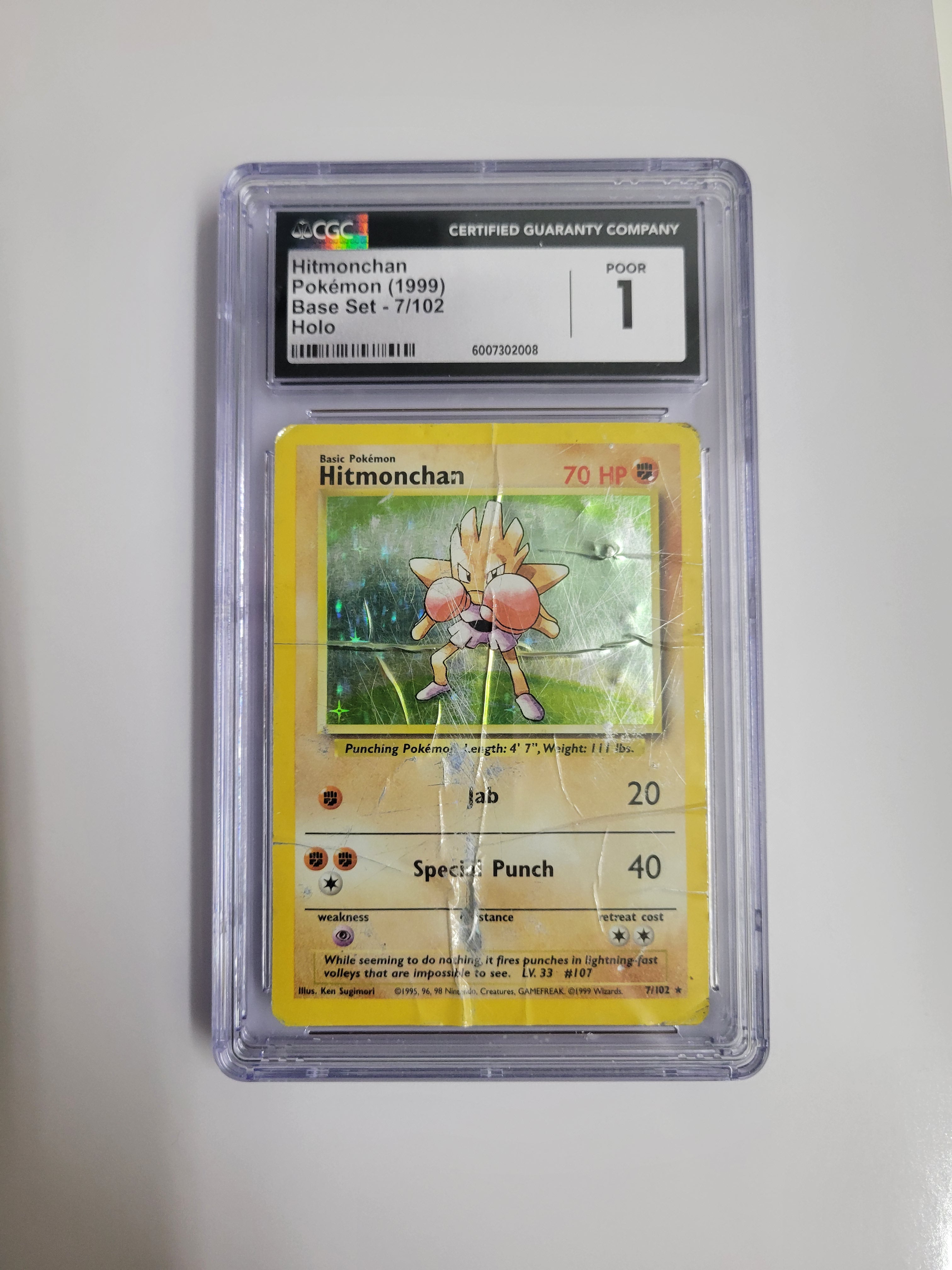 CGC 1 Hitmonchan 7/102 - Base Set